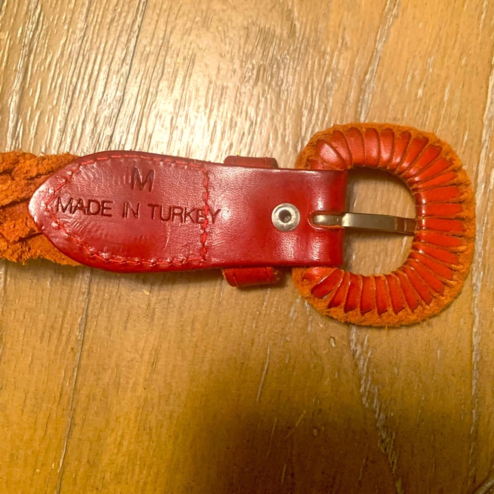 Vintage leather belt made in turkey. Size medium. Brownish red in color.